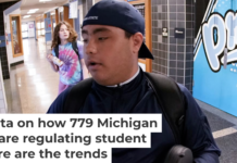 A student uses the unlocking mechanism as he leaves school for the day. Keith Srakocic/AP Photo